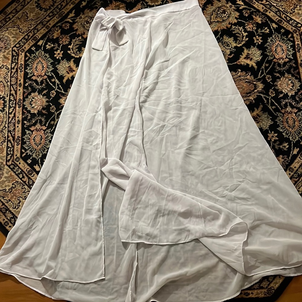 Sheer bathing suit skirt cover up. One size. White.